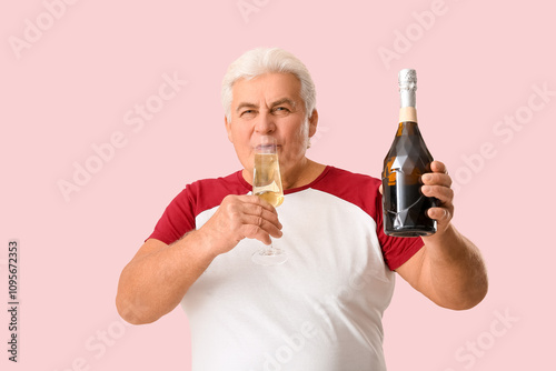Senior man with bottle and ...