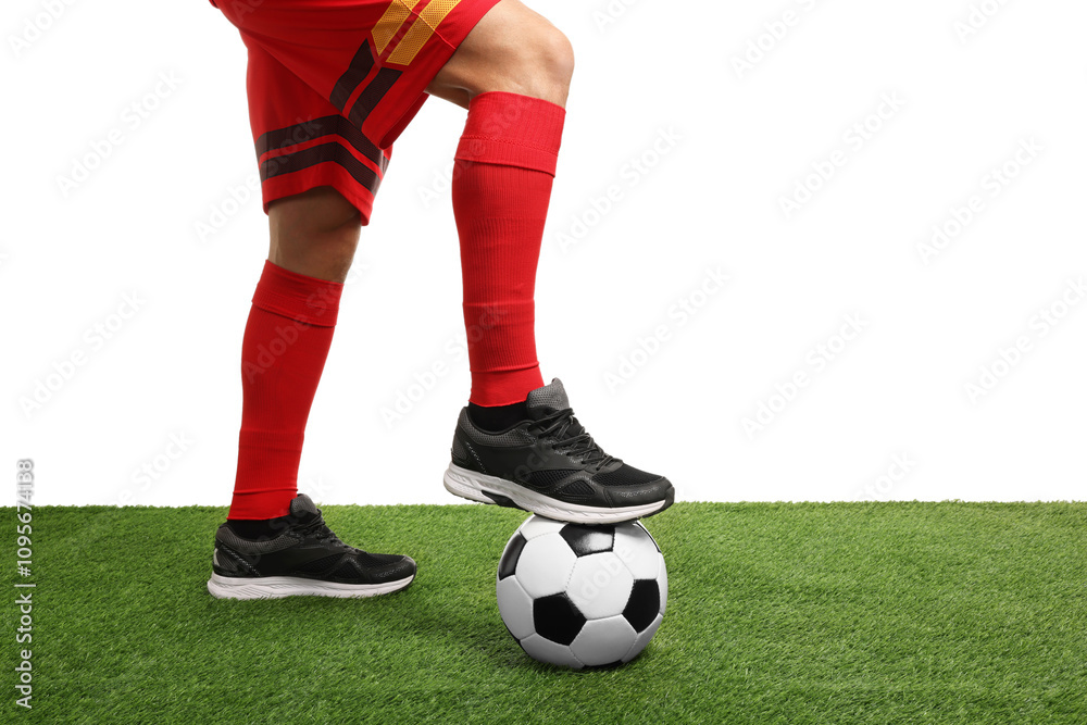 Football player with soccer ball on artificial grass against white background, closeup Football player with soccer ball on artificial grass against white background, closeup