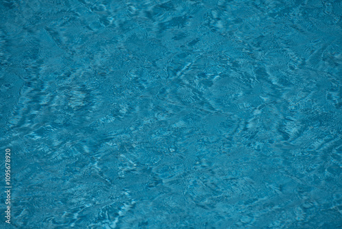 Surface of pool water. Sea water background texture. Water with ripples. Water waves pattern texture background. Abstract banner background. Blank space for text.