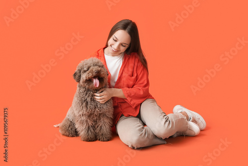 Young woman with brown Pood...