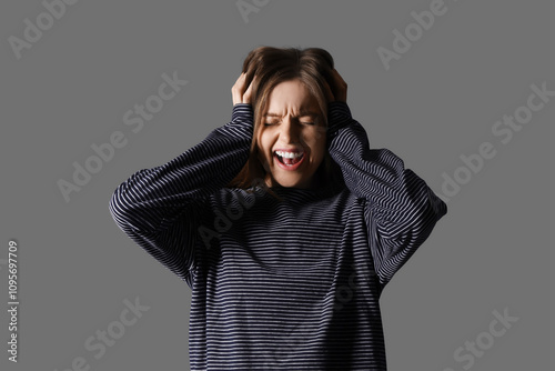 Young woman having panic at...