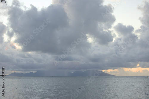Rain above an island in the sea