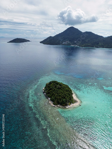 Indonesia Anambas Islands - Drone view to Telaga and Dinkor Island with Volcano photo