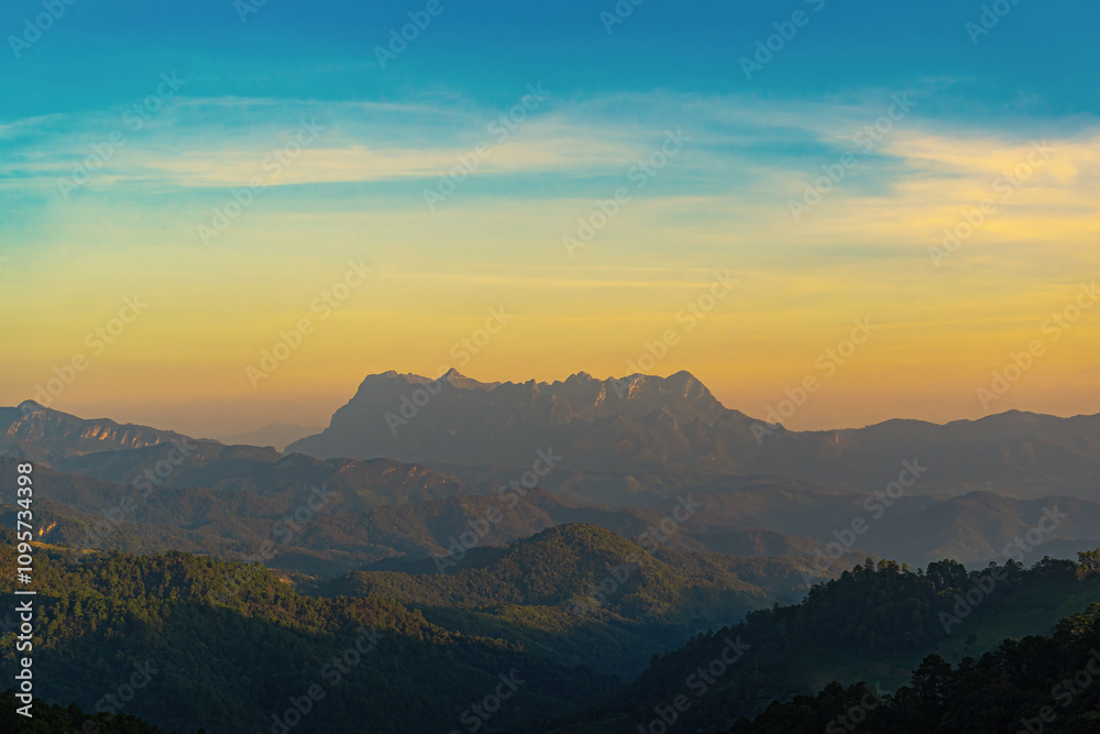 The scenery of Doi Luang Chiang Dao mountain peaks is from a viewpoint in the national park at sunrise. Hadubi hill viewpoint, Lao Wu village, Wiang Haeng, Chiang Mai, Thailand The scenery of Doi Luang Chiang Dao mountain peaks is from a viewpoint in the national park at sunrise. Hadubi hill viewpoint, Lao Wu village, Wiang Haeng, Chiang Mai, Thailand