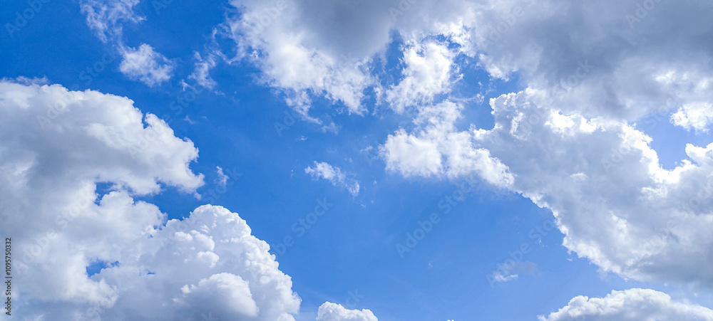 a blue sky with white clouds, blue sky with clouds, a blue sky with white clouds and a plane a blue sky with white clouds, blue sky with clouds, a blue sky with white clouds and a plane