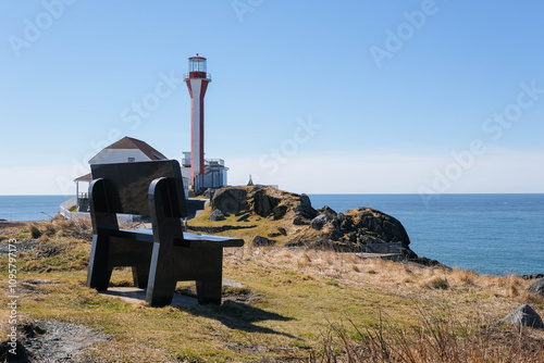 Cape Forchu Lighthouse in Yarmouth, Nova Scotia, Canada, Overlooking the Atlantic Ocean photo