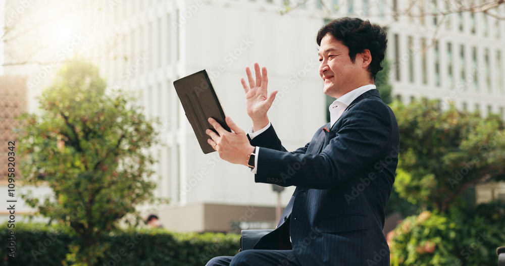 Asian, businessman or wave with tablet in city for video call, online meeting or virtual conference. Japanese, man or employee with smile or greeting on technology for communication in an urban town Asian, businessman or wave with tablet in city for video call, online meeting or virtual conference. Japanese, man or employee with smile or greeting on technology for communication in an urban town