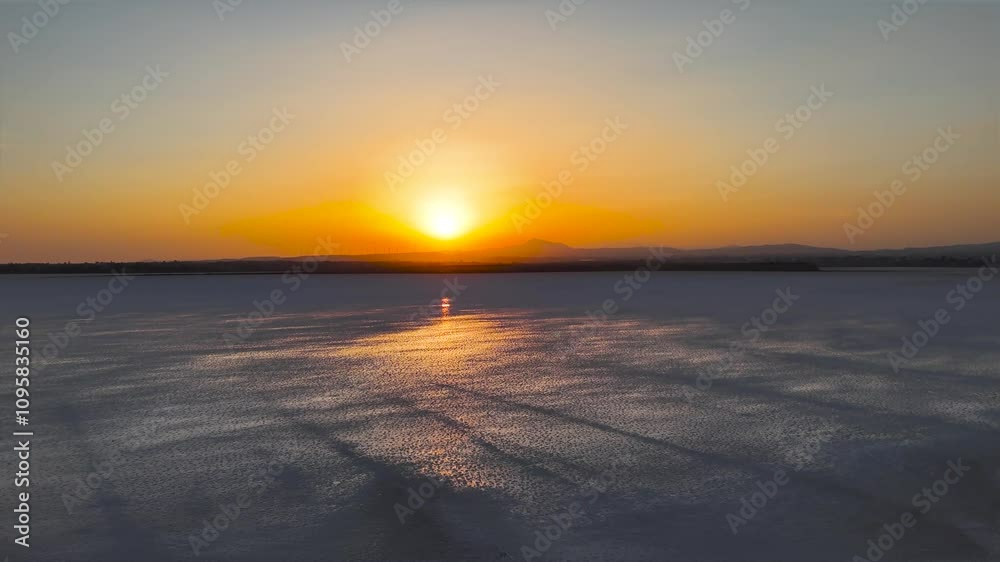 Scenic aerial view over Larnaca salt lake wetland during sunset, Cyprus Scenic aerial view over Larnaca salt lake wetland during sunset, Cyprus