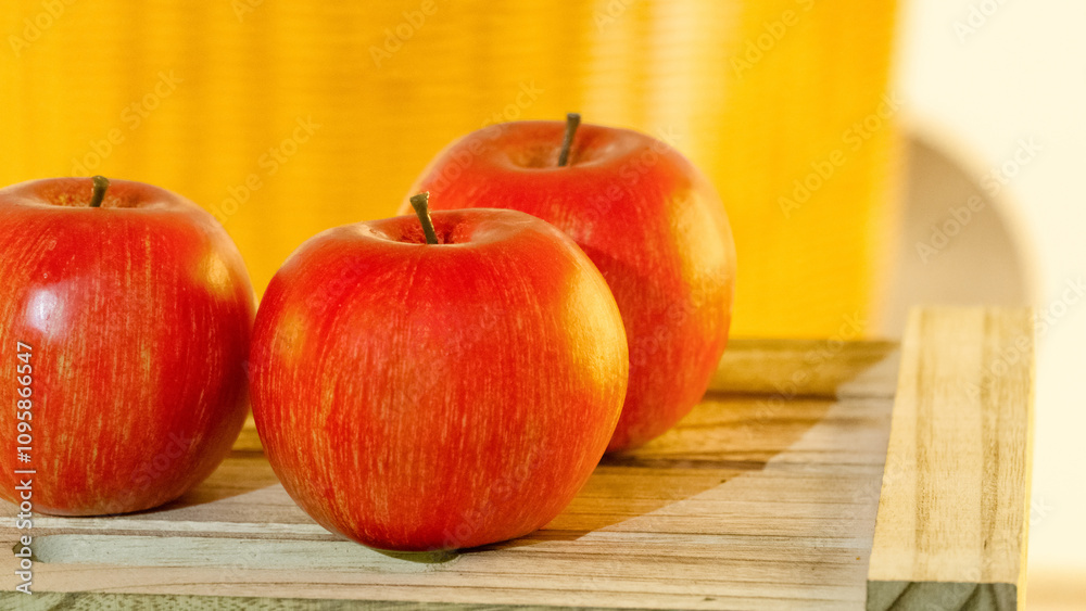 red apples on wooden table red apples on wooden table