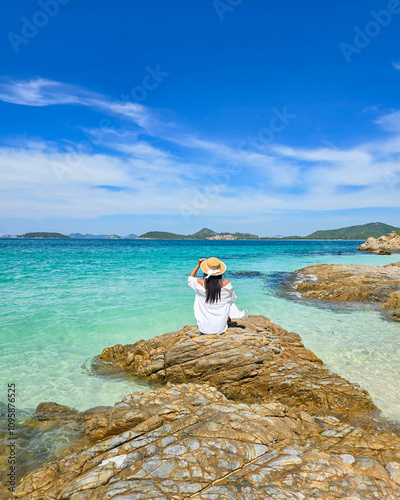 Basking in the Sun at Samae San Island in Thailand Near Crystal Clear Waters photo
