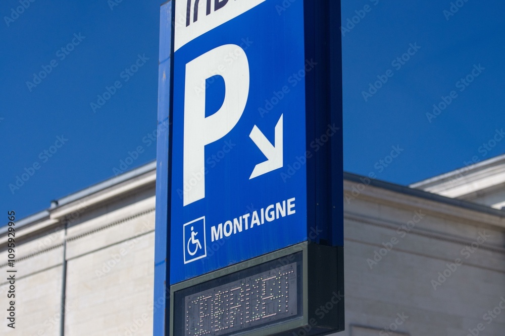 Blue Parking Sign with Accessibility Symbol in Dordogne France. Blue Parking Sign with Accessibility Symbol in Dordogne France.