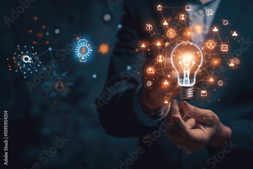 Businessman holding light bulb with marketing icons for business innovation. photo