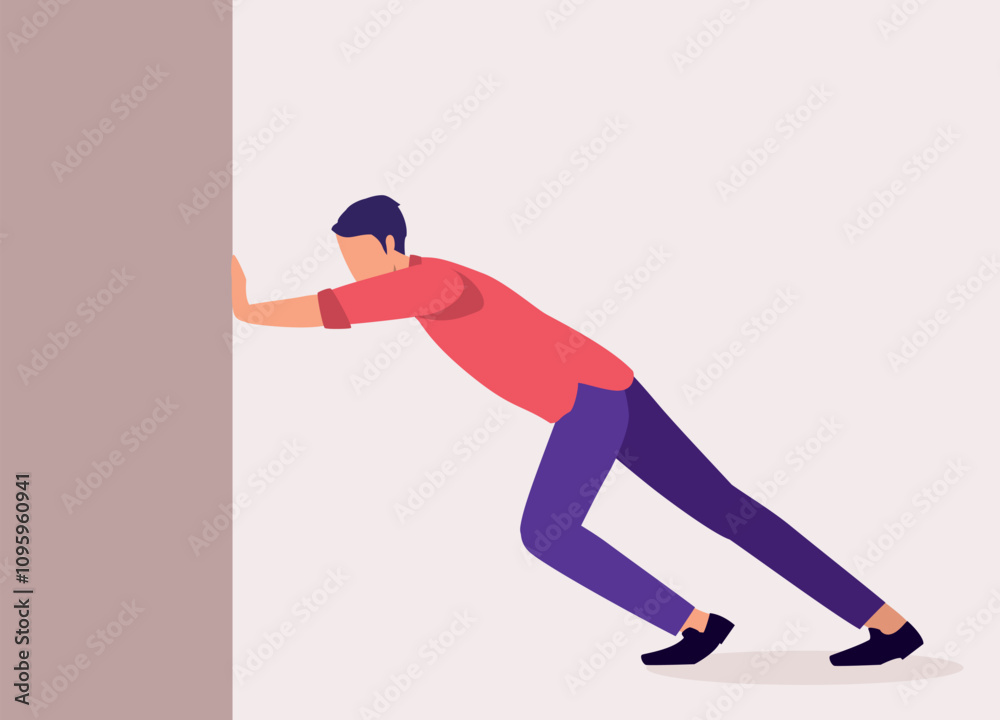 Side View Of A Young Businessman Pushing Hard Against A Wall.