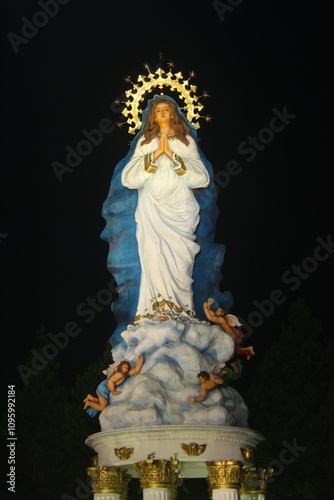 A large statue of the Assumption of Mary photo