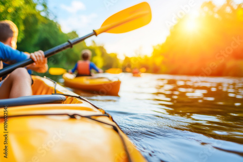 happy children kayaking down a scenic river photo