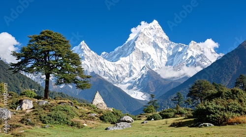 A breathtaking view of a snow-capped mountain surrounded by greenery and a clear blue sky, showcasing nature's beauty and majesty.
