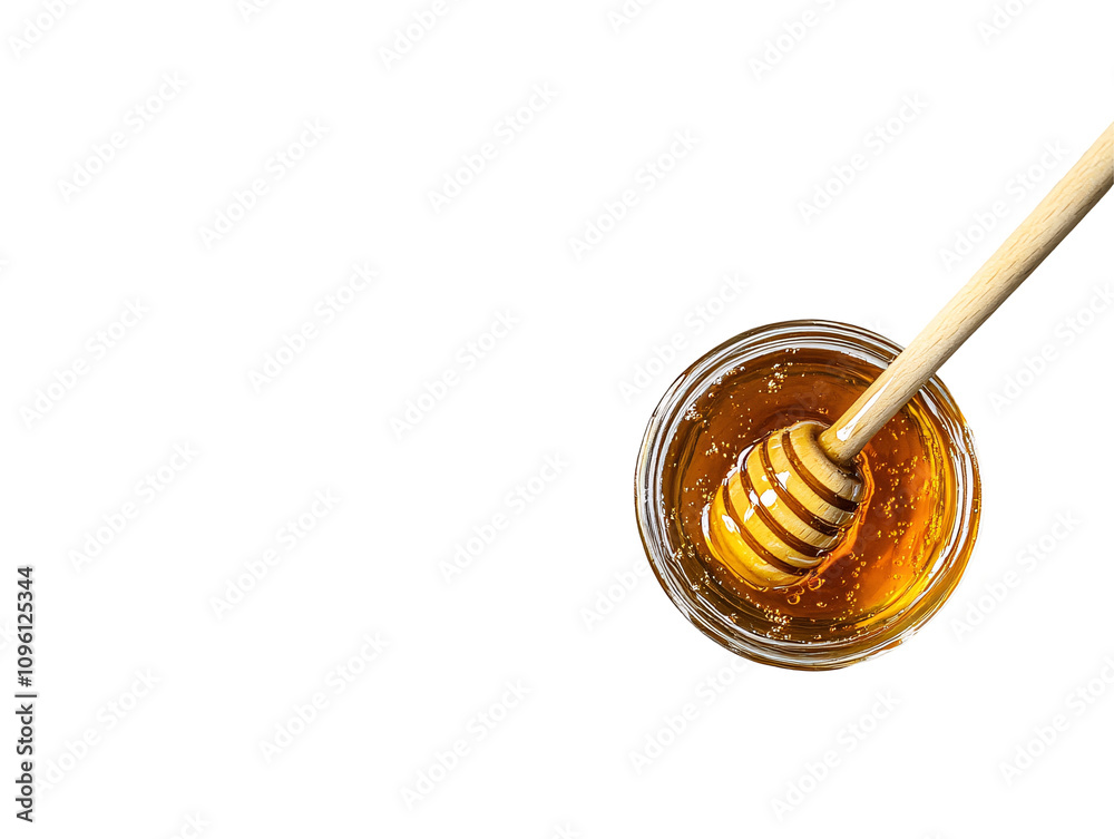 a honey in a glass with a wooden stick a honey in a glass with a wooden stick