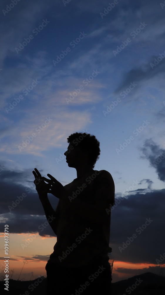 Young Boy Engrossed in His Smartphone, Exploring the Digital World with Curiosity and Focus, Capturing the Modern Connection of Youth and Technology, Perfect for Representing Mobile Use Young Boy Engrossed in His Smartphone, Exploring the Digital World with Curiosity and Focus, Capturing the Modern Connection of Youth and Technology, Perfect for Representing Mobile Use