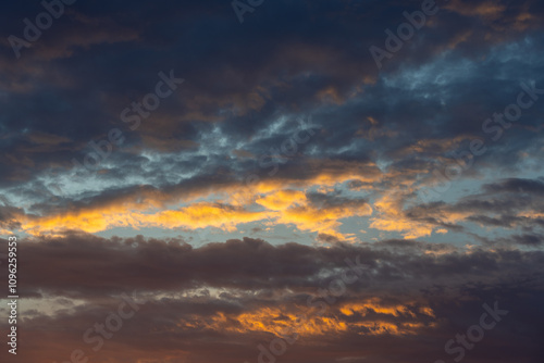 Schilderij op canvas Beautiful cloud formation on sunset sky.