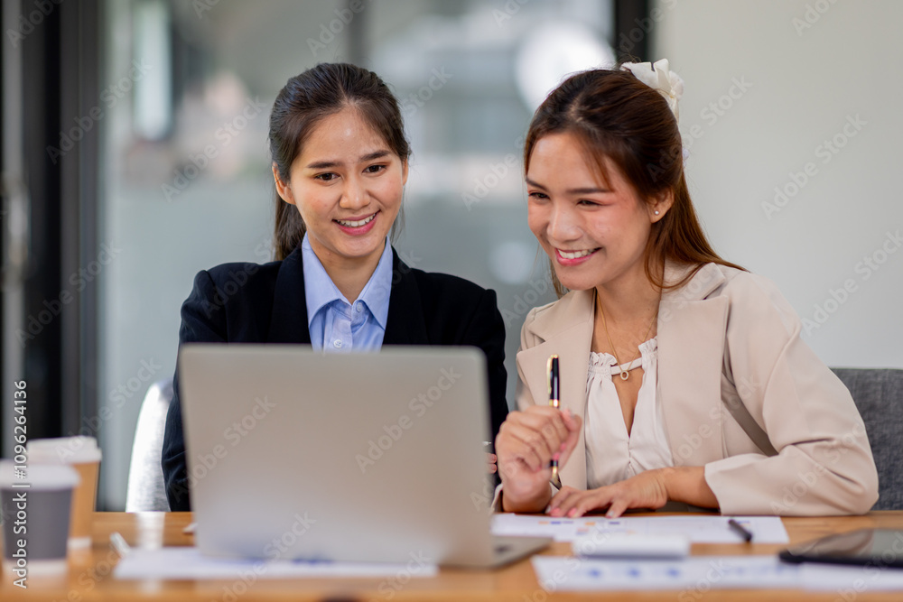Two asian business women Accounting using calculating income-expenditure and analyzing real estate investment documents data report Financial and tax systems concept. Two asian business women Accounting using calculating income-expenditure and analyzing real estate investment documents data report Financial and tax systems concept.