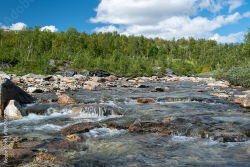 Little stream high up in Norway mountains.