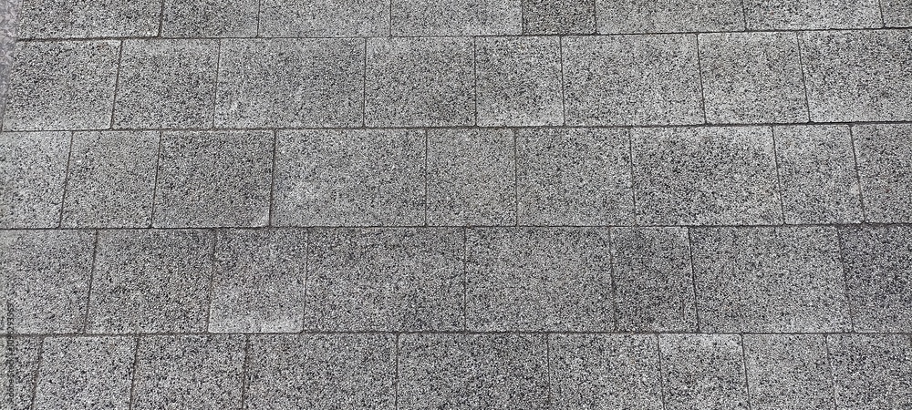 Fototapeta premium surface covered with grey rectangular tiles