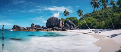 Stunning tropical beach at Anse Major with lush greenery rocks and clear turquoise waters under a bright blue sky