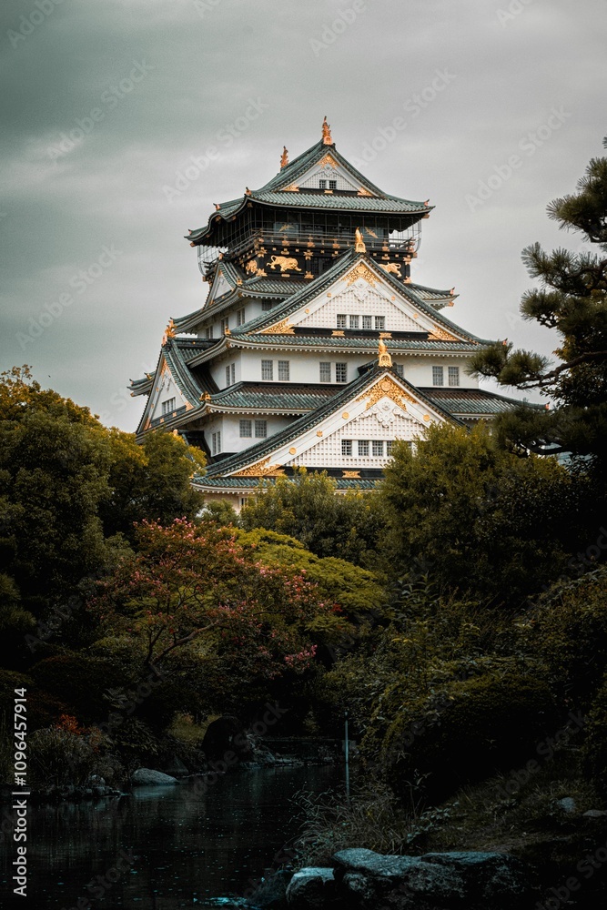 Osaka Castle with garden and pond Osaka Castle with garden and pond