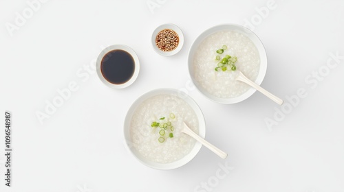 Delicious rice porridge bowls with green onions and soy sauce minimalist kitchen food clean aesthetic top view