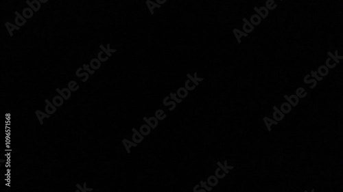 Pulsing white flashes illuminate the screen, creating a dynamic and energetic background against a sleek, dark setting.
