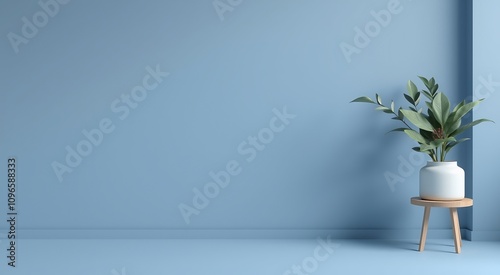 A single house plant in a white pot sitting on a wooden stool against a light blue wall.