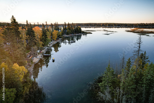 Fototapeta Naklejka Na Ścianę i Meble -  A beautiful lake with a forest in the background