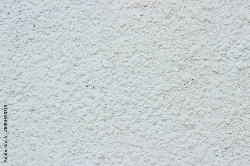Close-up of white cement plaster texture with a rough surface. Perfect for creating backgrounds or textured elements in design projects Close-up of white cement plaster texture with a rough surface. Perfect for creating backgrounds or textured elements in design projects