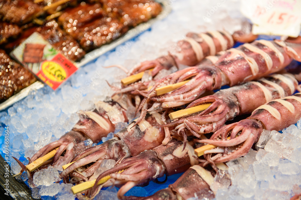 squid and seafood in kuromon market, Osaka Japan squid and seafood in kuromon market, Osaka Japan