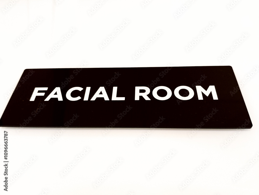a close up of a black rectangular sign with the words a close up of a black rectangular sign with the words
