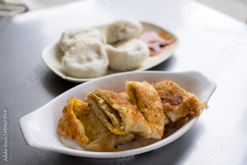 Crispy fried pastry and steamed buns