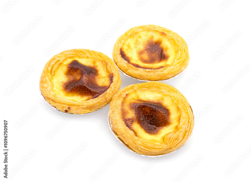 Egg Custard tart (Pastel de nata) in aluminum foil cup isolated on white background. Egg Custard tart (Pastel de nata) in aluminum foil cup isolated on white background.