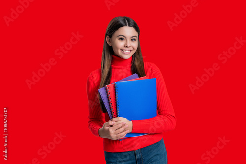 Back to school. Knowledge and education. Teen girl student isolated on red. September 1. High school education. Knowledge through study. Teen girl studying with workbook. Philosophical knowledge