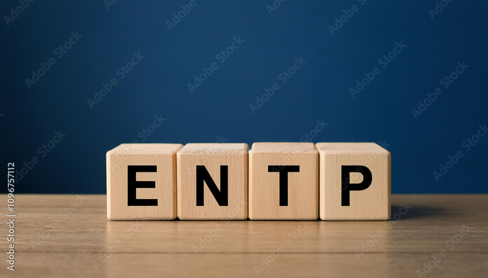 Wooden cubes with abbreviation ENTP on table. Extraverted, Ntuitive, Thinking, Perceiving. Wooden cubes with abbreviation ENTP on table. Extraverted, Ntuitive, Thinking, Perceiving.