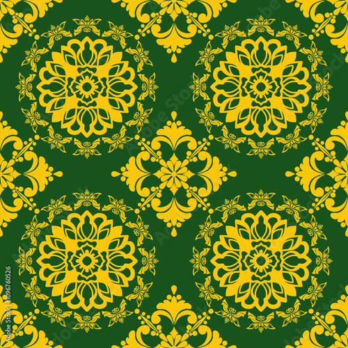 A seamless pattern featuring intricate floral motifs in shades of gold and green. The design incorporates a repeating symmetrical pattern, creating a luxurious and traditional aesthetic.