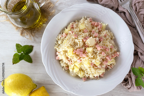Italian Style Rice Salad on a white dish and light background
