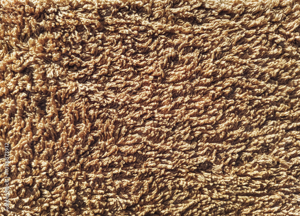 Close-up of beige long pile carpet background. Texture of factory floor covering. Close-up of beige long pile carpet background. Texture of factory floor covering.