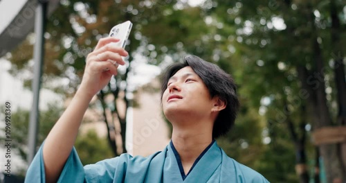 Japanese man, selfie and traditional clothes with smile, montsuki and post with low angle in nature. Person, photography or profile picture with memory, happy and kimono for social media in morning photo