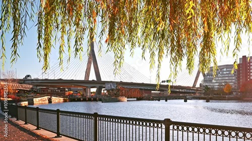 Boston in Massachusetts, USA at sunrise with the iconic Zakim bridge spanning over the famous Charles river. photo