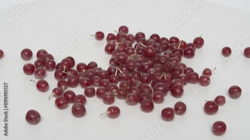 A delightful arrangement of Fresh Red Berries carefully placed on a pristine White Plate