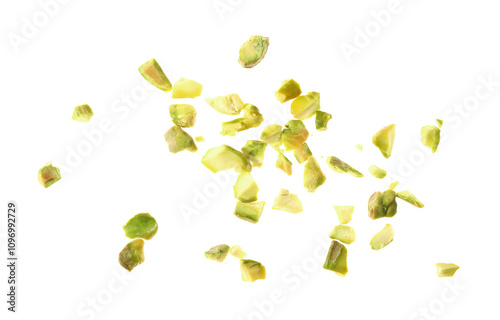 Pieces of peeled pistachio nut isolated on white