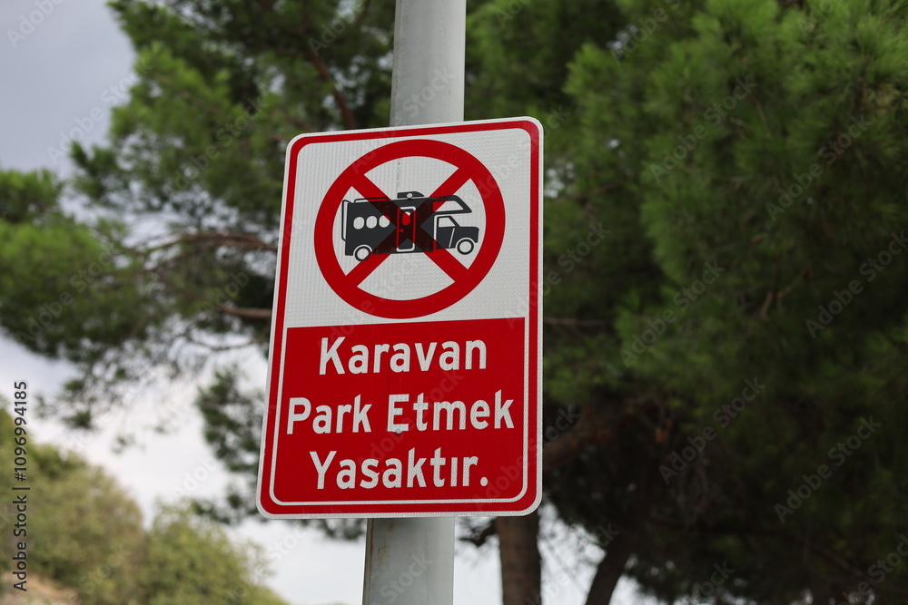 Parking of caravans is prohibited. no parking sign Parking of caravans is prohibited. no parking sign