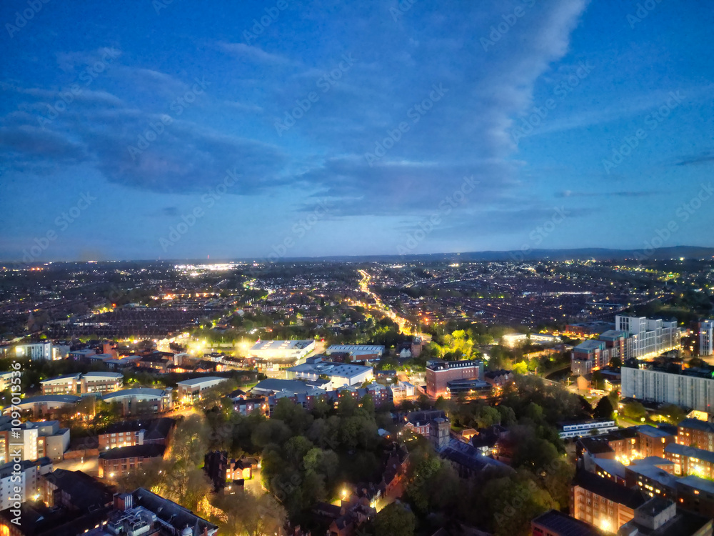Naklejka premium High Angle View of Illuminated Historical Central Leicester City of England UK at Night. Aerial Footage Was Captured with Drone's Camera During Midnight of April 26th, 2024 from Medium High Altitude.