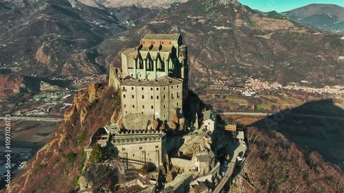 Aerial view of the Sacra di San Michele, an imposing abbey that dominates the entrance to the Susa Valley from the top of Mount Pirchiriano. Italy