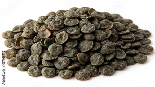A pile of dark seeds, possibly for planting or agricultural use.